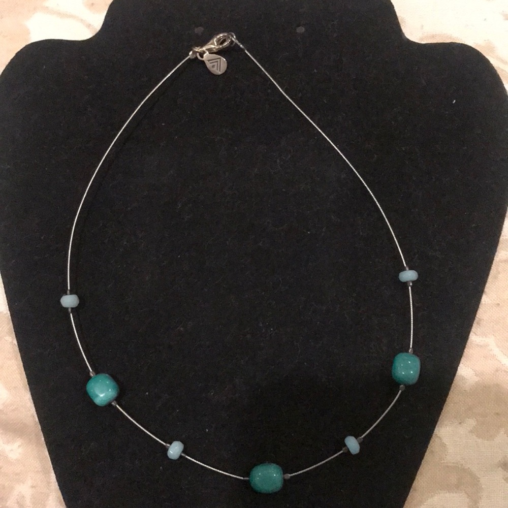 Wire necklace with turquoise colored stones